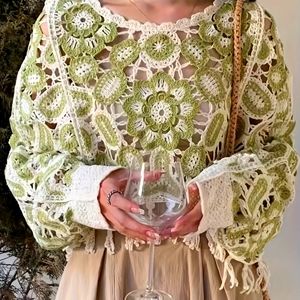 Bohemian floral pattern crochet shawl with sleeves